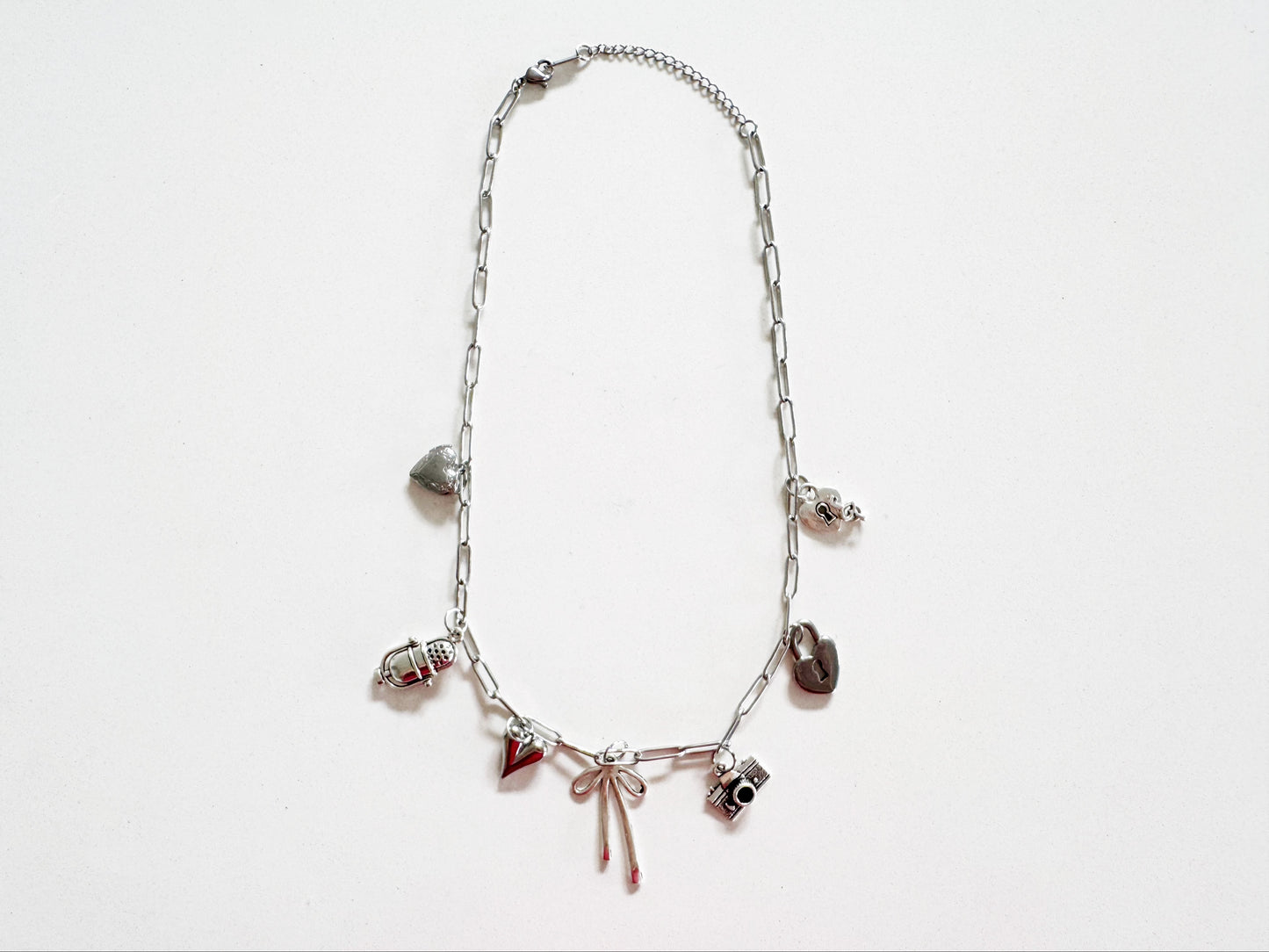 Lover of Music, Photography and all things Bow Necklace